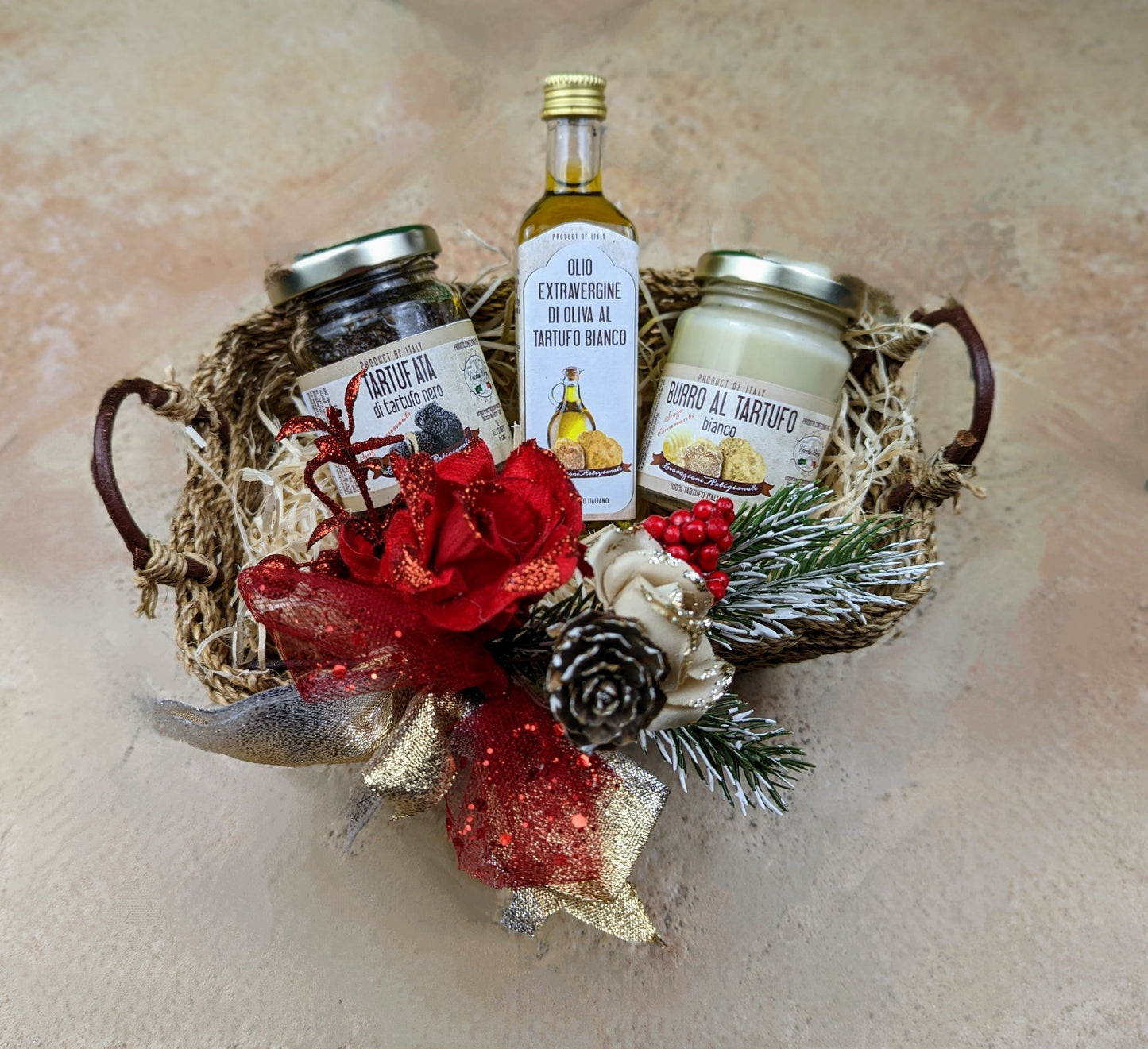 Beautiful wicker basket with truffle sauce, butter and oil